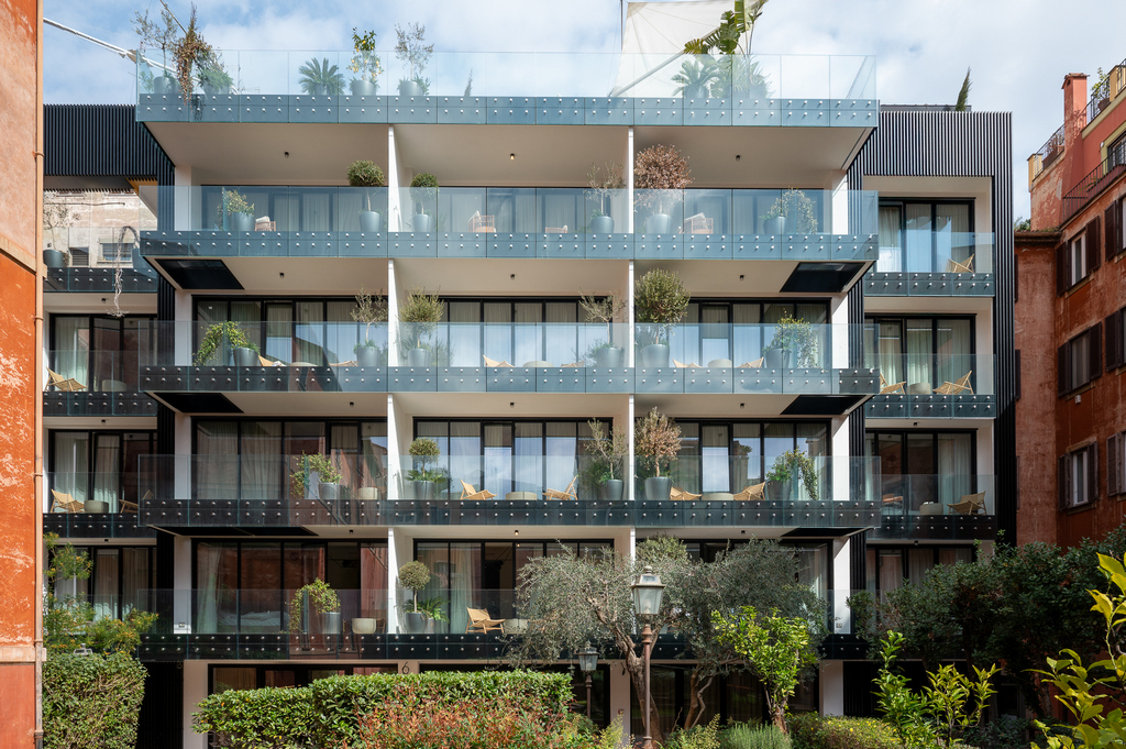 Facade of master Trevi Rome Aparthotel with elegant balconies overlooking the historic streets of Rome